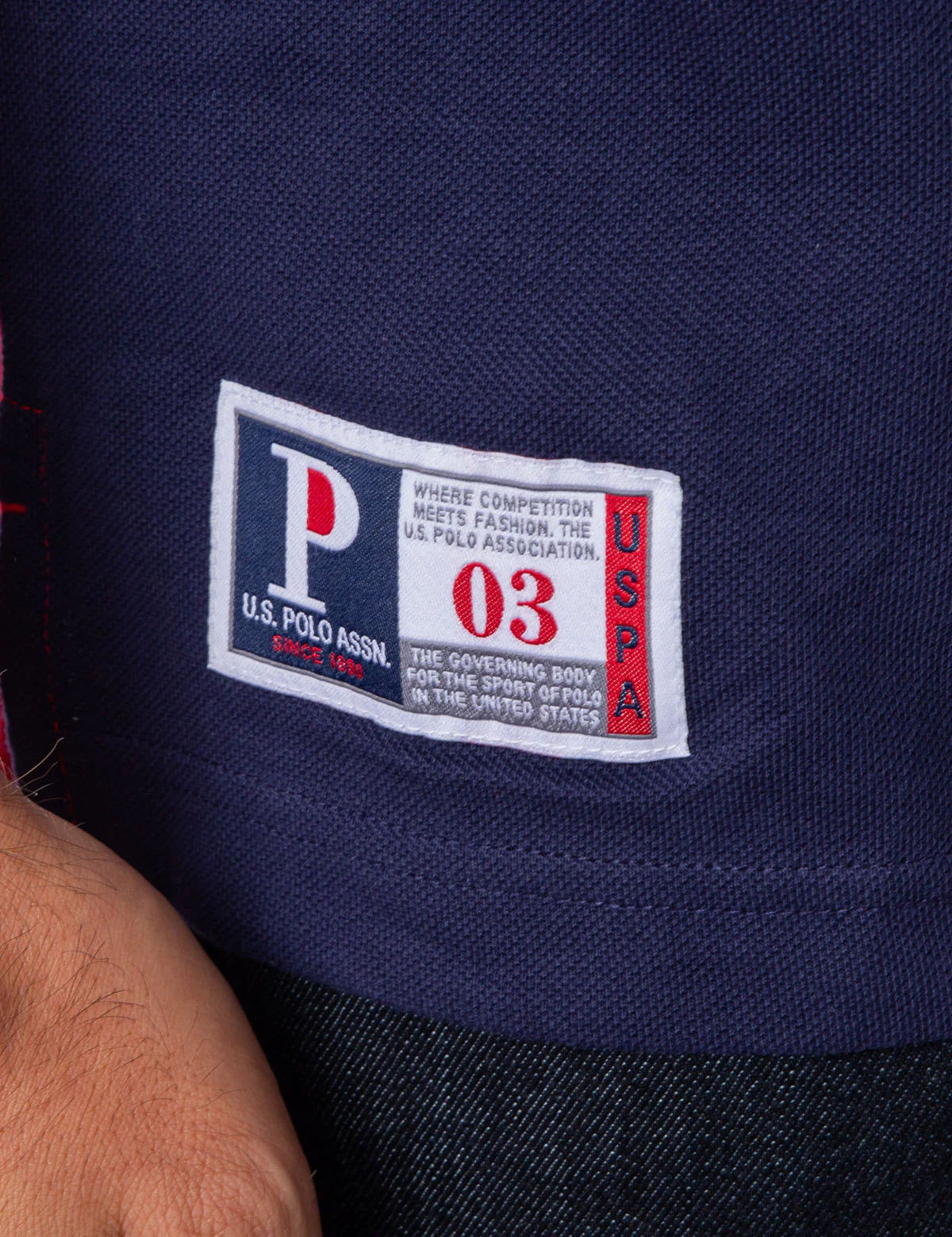 EMBOSSED CHEST LOGO DIAGONAL COLORBLOCK POLO SHIRT - Image 11