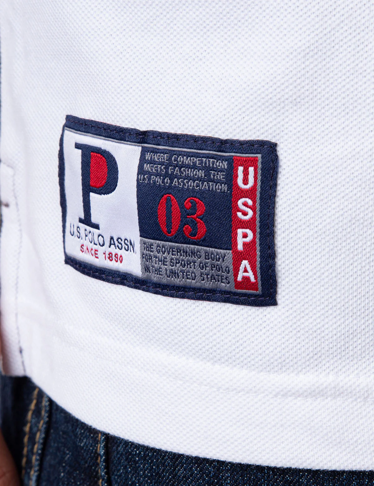 EMBOSSED CHEST LOGO DIAGONAL COLORBLOCK POLO SHIRT - Image 5