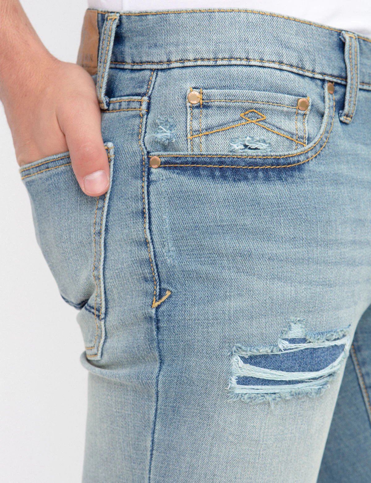 REPREVE® SKINNY FIT DISTRESSED JEANS WITH PATCH REPAIR - Image 4